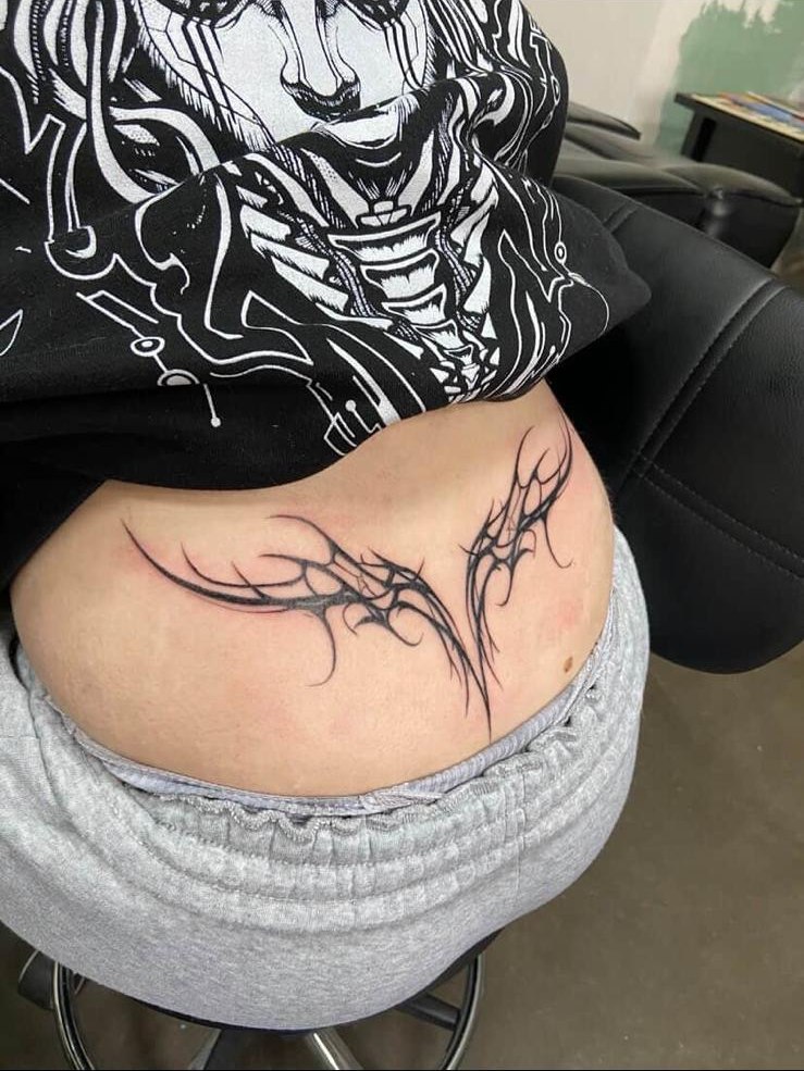 Tribal Rücken Tattoo